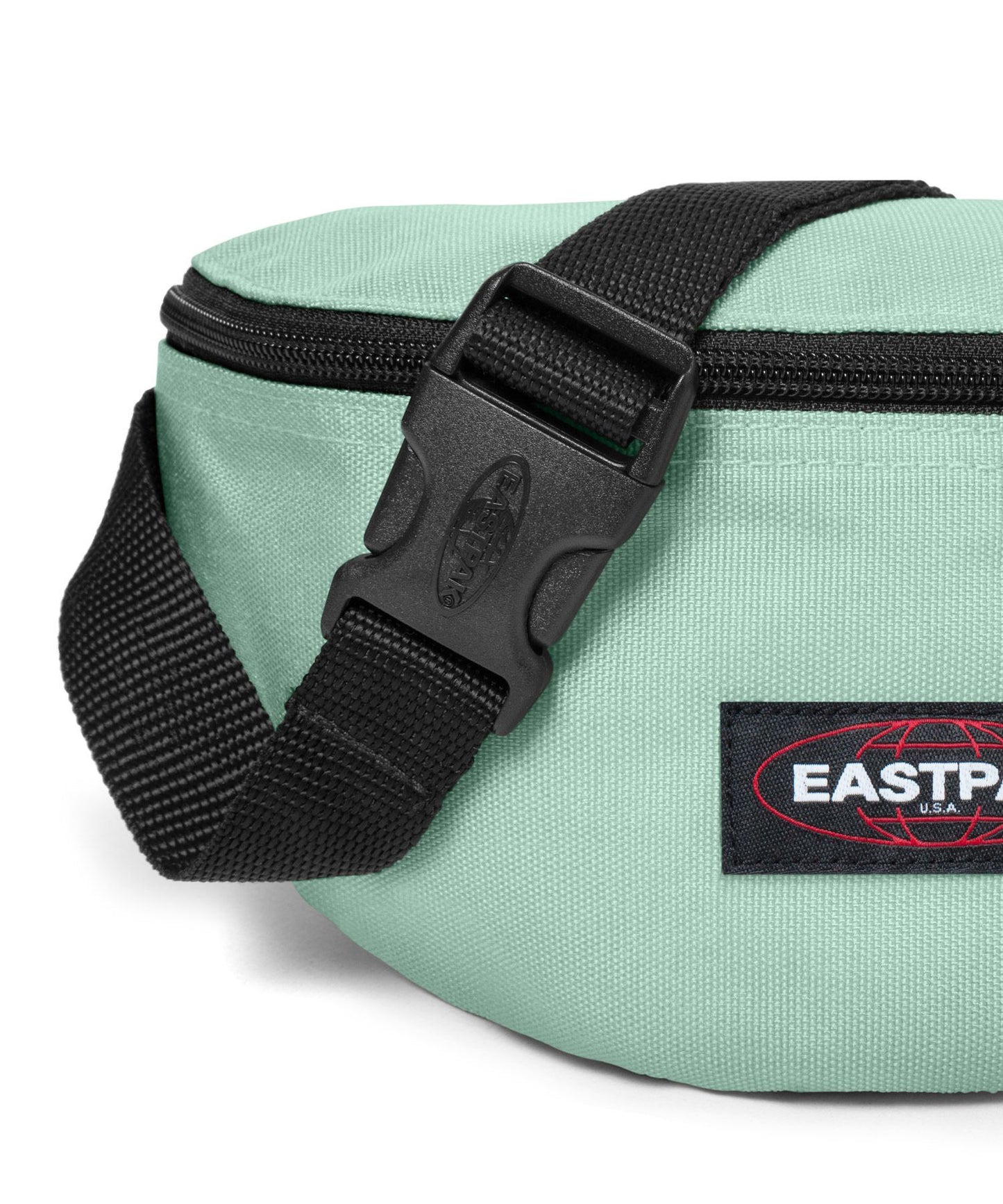 eastpak-rinonera-springer-calm-green-color verde-bolsillo trasero-cierre cremallera-producto impermeable y vegano..