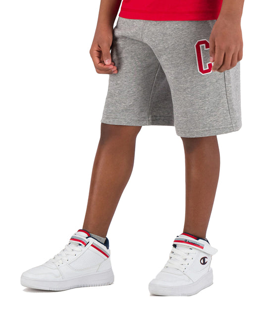 Champion pantalón corto para niño de color rojo con la C de Champion en el lateral-dos bolsillos laterales-forro polar-ligero